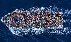 Immigrants' boats in the sea.